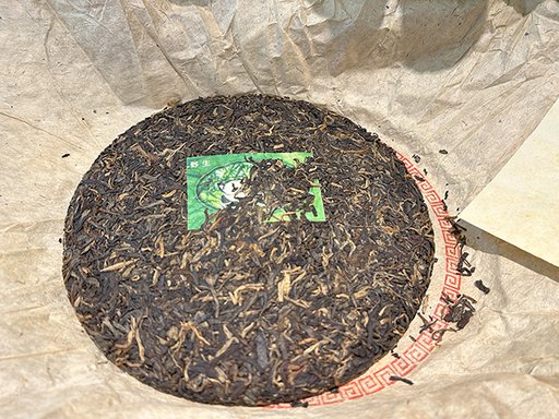 图为郎河2000年易武熊猫饼生茶
